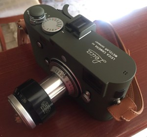 Leica rangefinder with antique lens